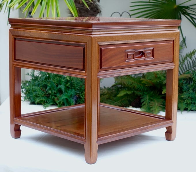 Chinese hardwood side table with single drawer and shelf below, available with brass or carved drawer handles in a range of wood colours.