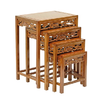 Nest of rosewood tables with open dragon carving