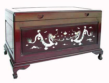 chinese camphorwood chest with dragon inlays.