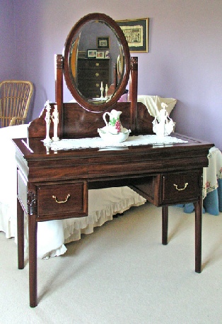 Bespoke dressing table with mirror, part of a set including bespoke wardrobe, bespoke chest of drawers and bespoke bedside cabinets.