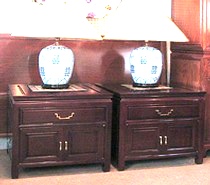 Pair of Chinese rosewood lamp tables with drawer and 2 doors.
